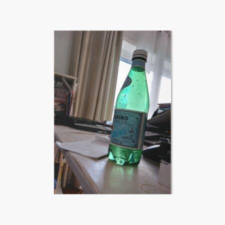 A bottle of water on the table Art Board Print