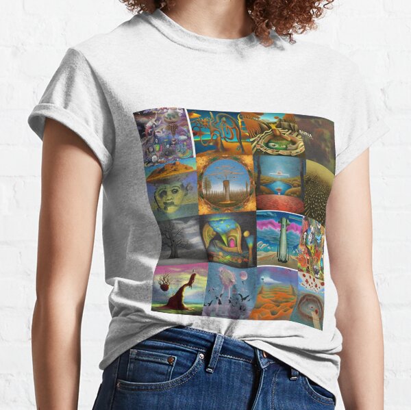 Surreal: This word typically evokes images of dreamlike landscapes, distorted shapes and figures, and otherworldly scenes. Classic T-Shirt
