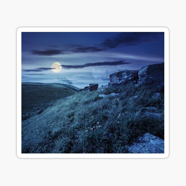boulders on hillside in high mountains at night Sticker