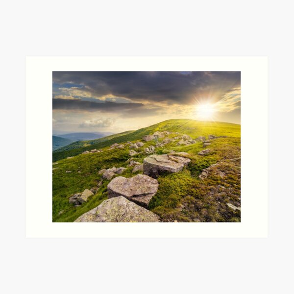 white boulders on the hillside at sunset Art Print