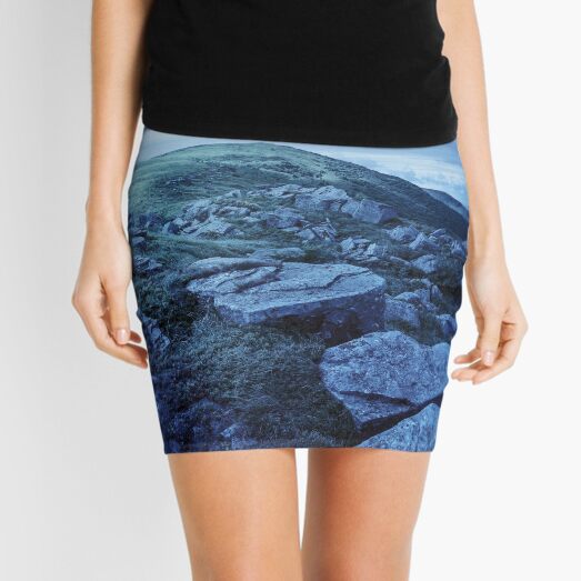 white boulders on the hillside at night Mini Skirt