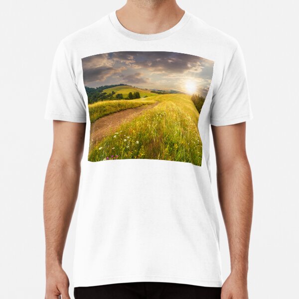 road through the meadow on hillside at sunset Premium T-Shirt