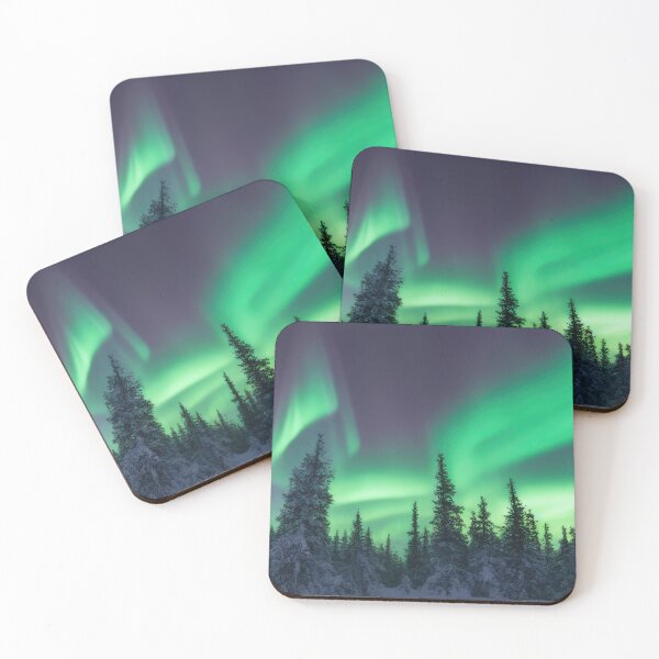 Item preview, Aurora borealis in winter trees designed and sold by pietrofoto.