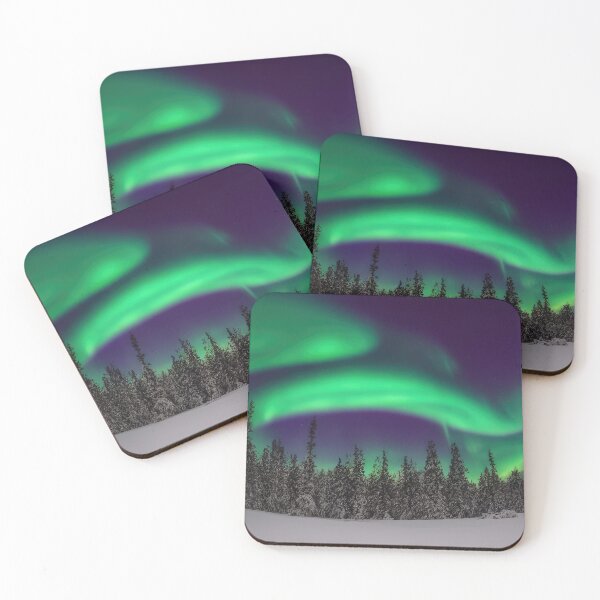 Item preview, Aurora borealis in winter trees designed and sold by pietrofoto.