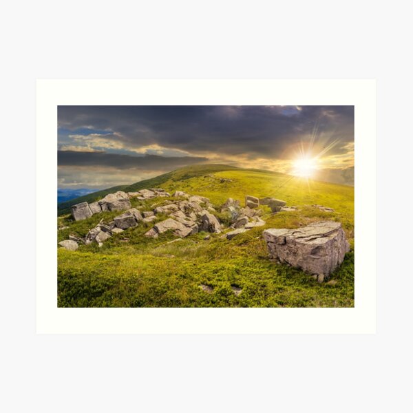white boulders on the hillside at sunset Art Print