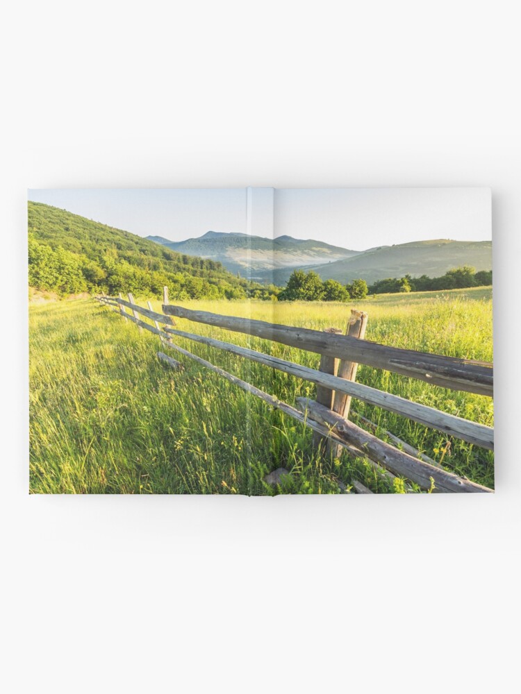 Alternate view of fence on hillside meadow in mountain Hardcover Journal
