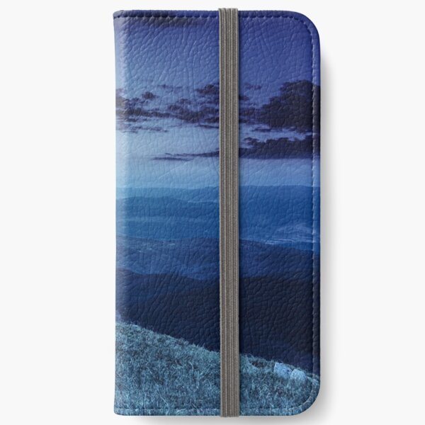 boulders on the endge of mountain at night iPhone Wallet