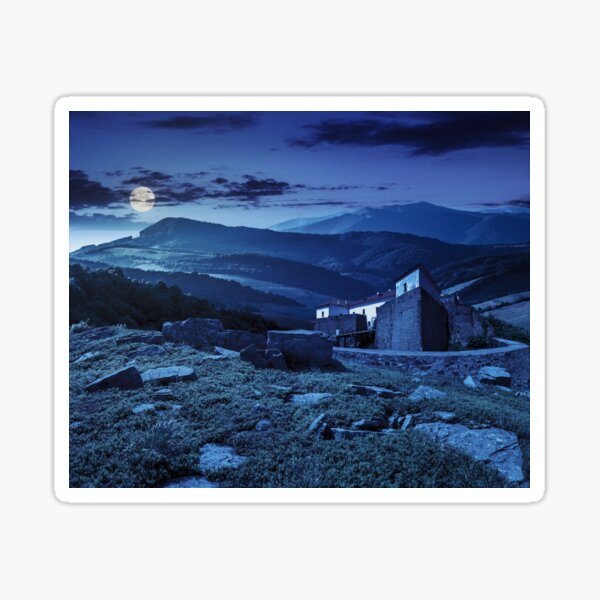 composite landscape with fortress in woods on mountain hillside at night Sticker