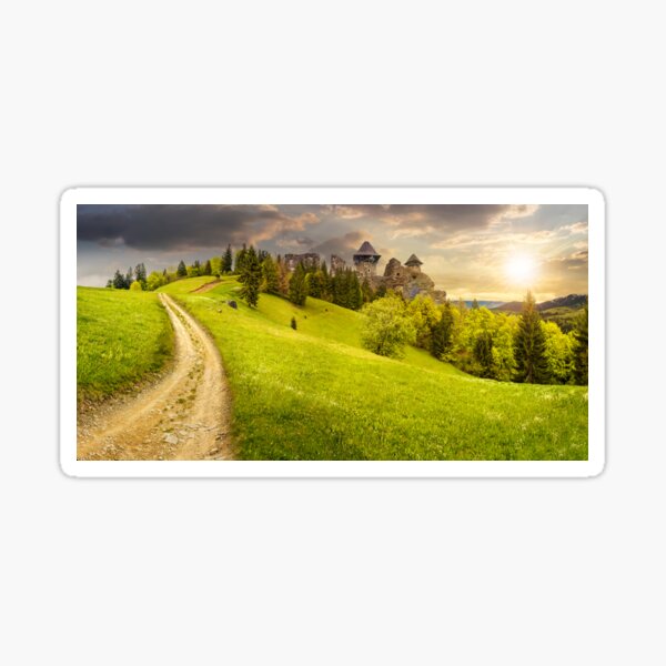 path to fortress ruins on hillside with forest at sunset Sticker