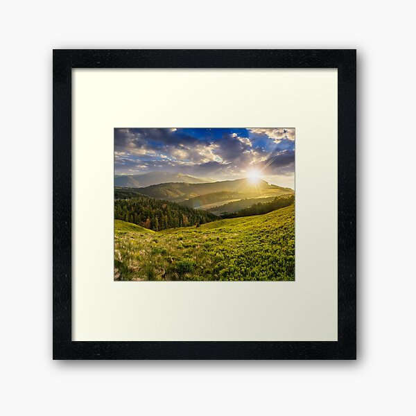 landscape with valley and forest in high mountains at sunset Framed Art Print