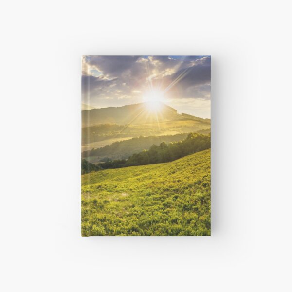 landscape with valley and forest in high mountains at sunset Hardcover Journal