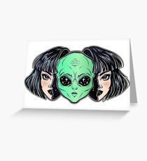 Colorful vibrant portrait of an alien from outer space face in disguise as human girl. Greeting Card