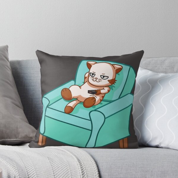 Item preview, cat sitting comfortably on the couch and ready to watch television in shades of brown and light blue, cartoon style. designed and sold by kitsuneins.