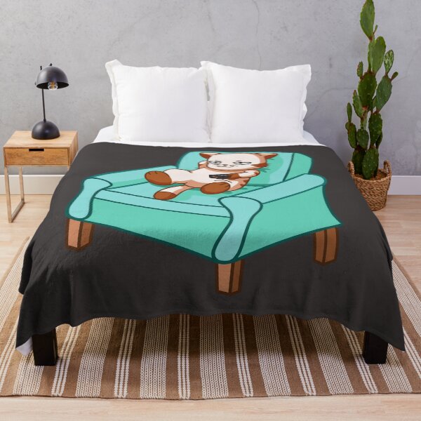 Item preview, cat sitting comfortably on the couch and ready to watch television in shades of brown and light blue, cartoon style. designed and sold by kitsuneins.