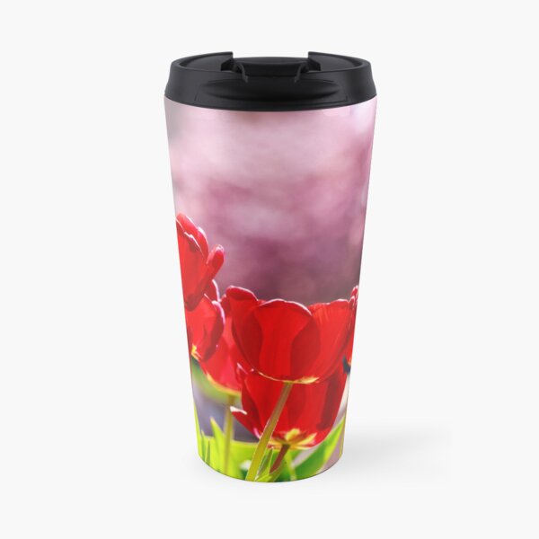 red tulip on color blurred background Travel Mug