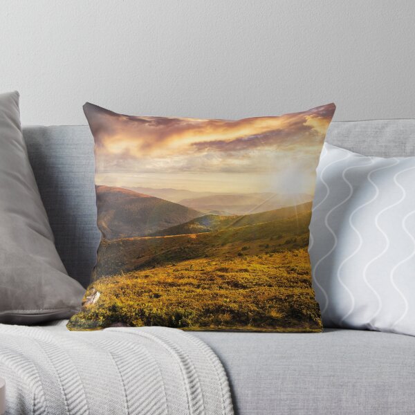hillside with stones in high mountains at sunset Throw Pillow