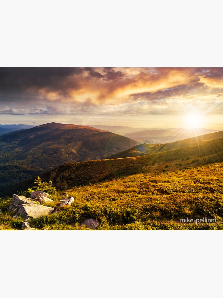 hillside with stones in high mountains at sunset by mike-pellinni