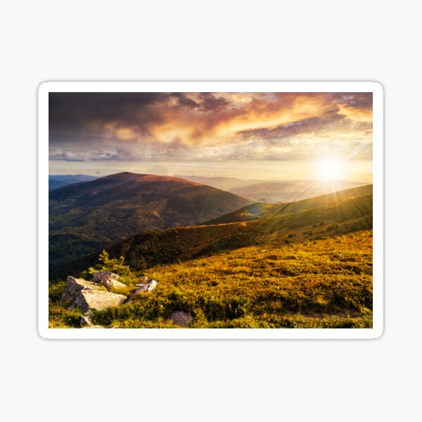 hillside with stones in high mountains at sunset Sticker