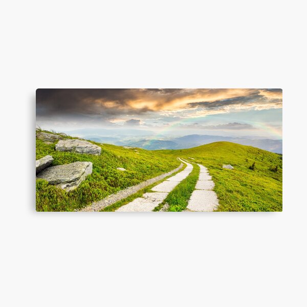 road on a hillside near mountain peak Canvas Print