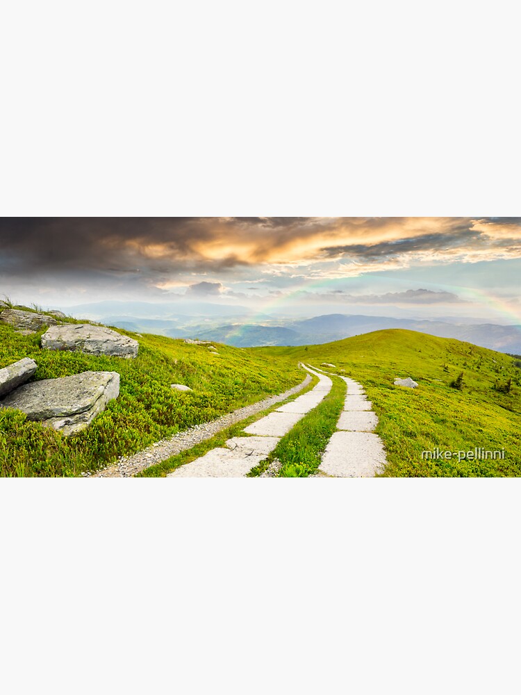 road on a hillside near mountain peak by mike-pellinni