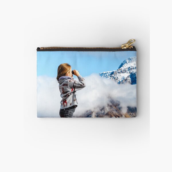 Item preview, Cute little girl investigating Alps mountains using binocular, Switzerland designed and sold by Alexander Sorokopud.