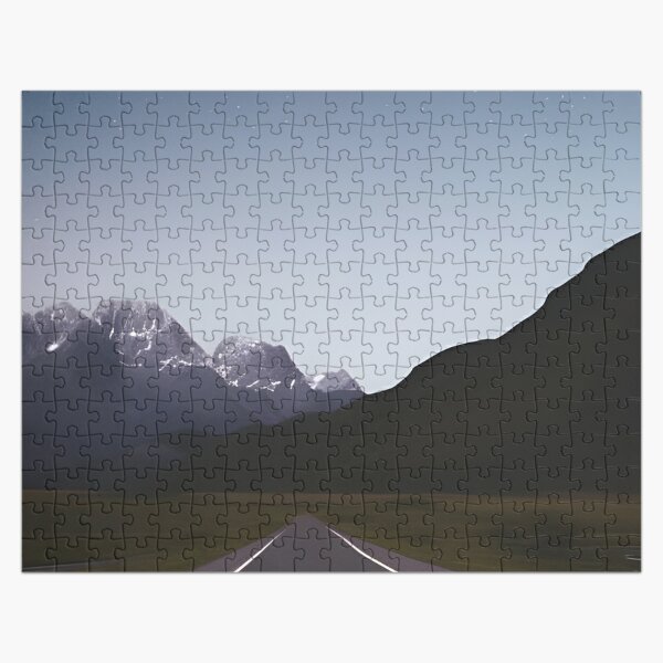 Mountain peaks Sleep in the darkness of the night.  Quiet valleys are full of fresh haze Jigsaw Puzzle