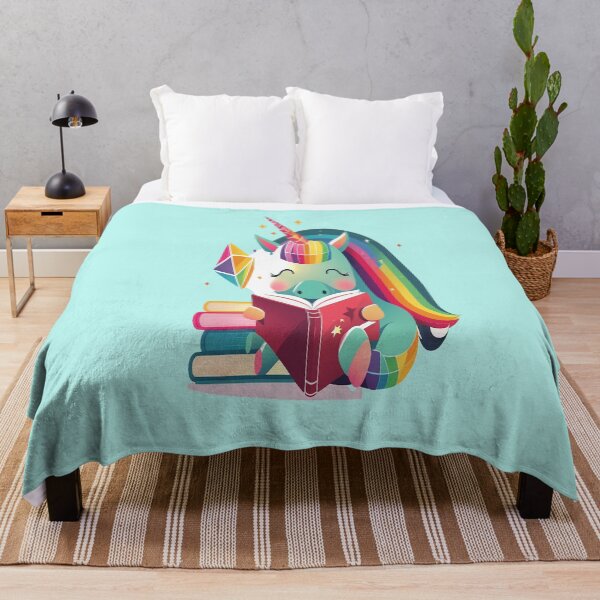 Artikelvorschau, Design eines Einhorns, das ein Buch in Regenbogenfarben liest entworfen und verkauft von zzibel.