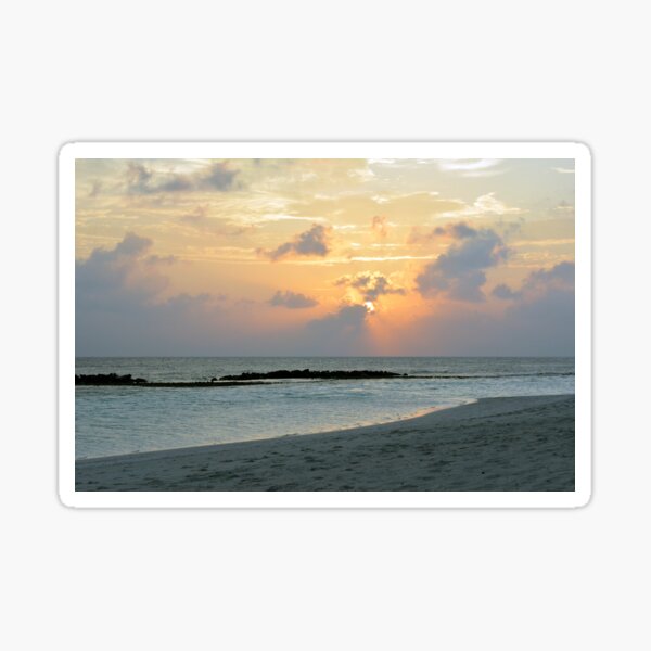 Sunset on a cloudy sky in the Maldives Sticker