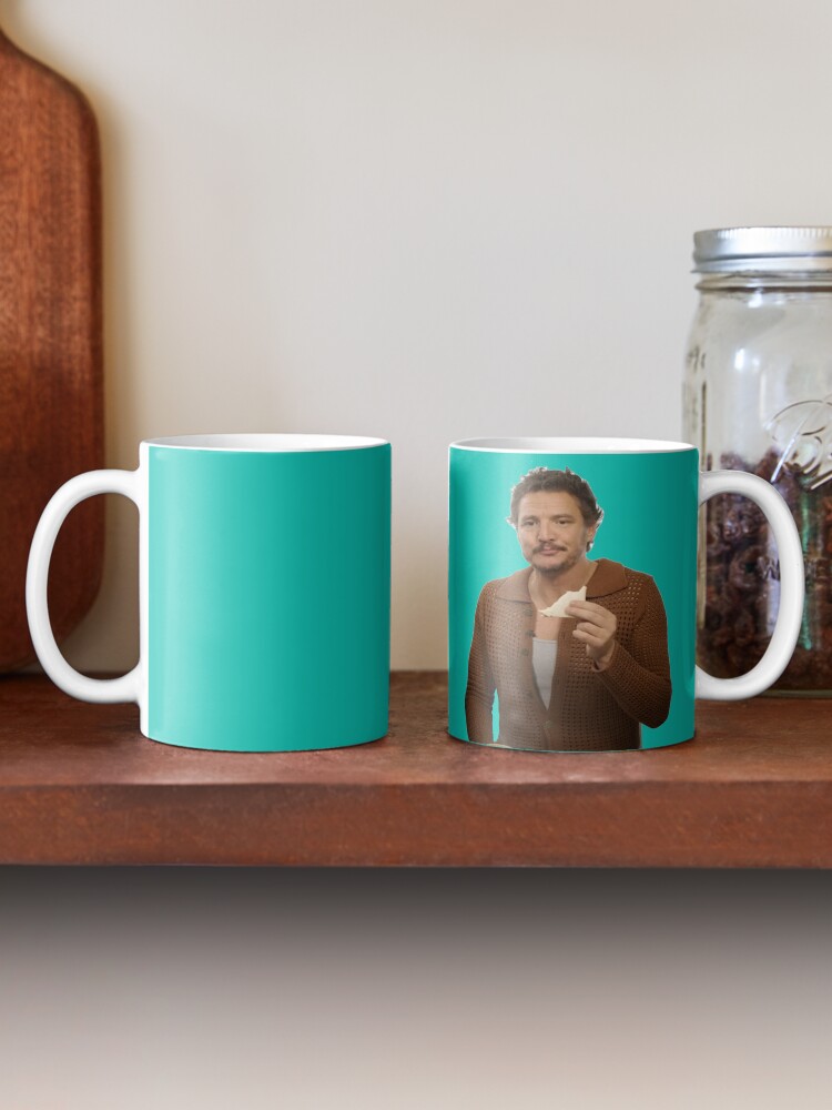 Thumbnail 2 of 6, Coffee Mug, Pedro Pascal eats a sandwich... designed and sold by iamwickedz.