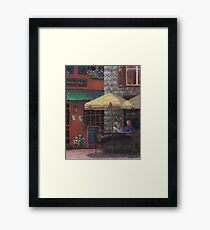 Relaxing at the Cafe Framed Print