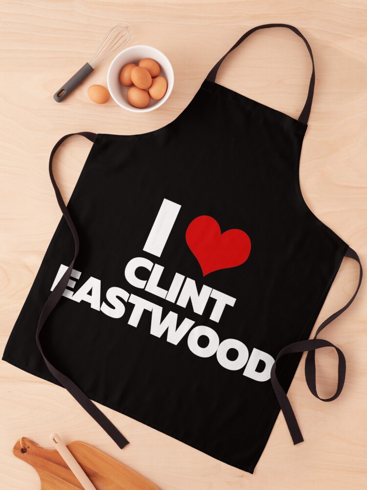 Aperçu 1 sur 6. Tablier avec l'œuvre I Love Clint Eastwood (White Text) créée et vendue par theartcreatore.