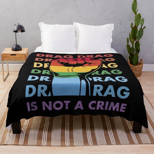 Item preview, Drag Is Not A Crime Funny LGBTQ Gay Pride Equality Rainbow Fist designed and sold by Designer-Girl.