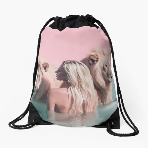 Woman swimming with lions Drawstring Bag