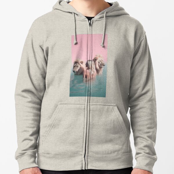 Woman swimming with lions Zipped Hoodie