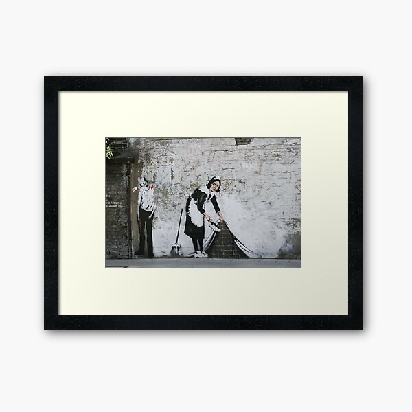 Sweep it under the Carpet, Banksy Framed Art Print