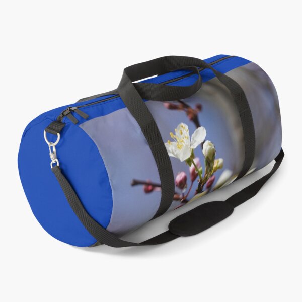 Item preview, Cherry blossoms and plum blossoms in spring with a blue background designed and sold by Binas-gallery.