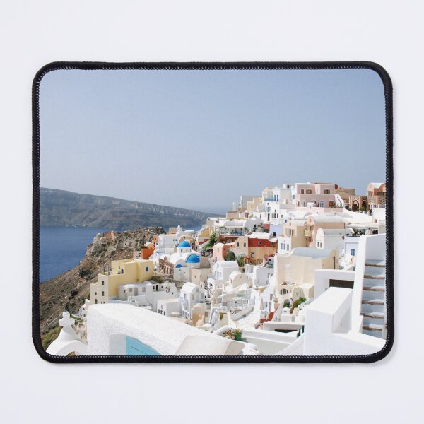 Item preview, Santorini's Iconic White Homes Amidst the Blue Sea designed and sold by szymontravels.