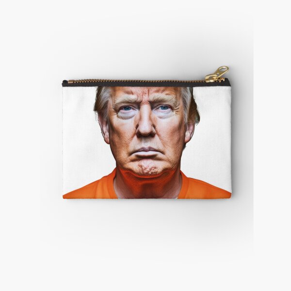 Item preview, Donald Trump’s mugshot in an orange jumpsuit. full color hyper realistic photo with High definition detail, over head fluorescent lighting, white background designed and sold by OnlyShowers.