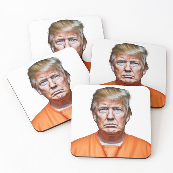 Item preview, Donald Trump’s mugshot in an orange jumpsuit. full color hyper realistic photo with High definition detail, over head fluorescent lighting, white background designed and sold by OnlyShowers.
