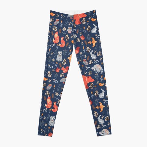 Fairy-tale forest. Fox, bear, raccoon, owls, rabbits, flowers and herbs on a blue background. Leggings