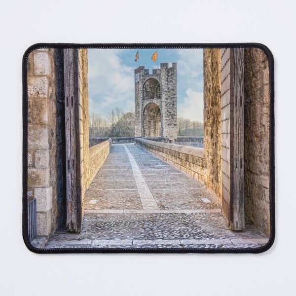 Item preview, Besalú's Iconic Bridge and Defensive Tower Seen Through the City Gate, Catalonia, Spain Travel Photography designed and sold by Marc Garrido Clotet.