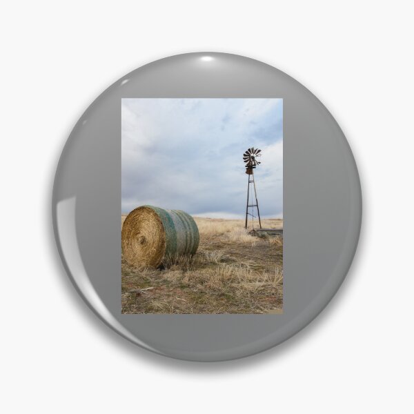 Item preview, Prairie Life - Old Windmill and Round Hay Bale on Autumn Day in Oklahoma Graphic  designed and sold by hahakilka55.