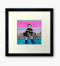 Boy on the Rocks Framed Print