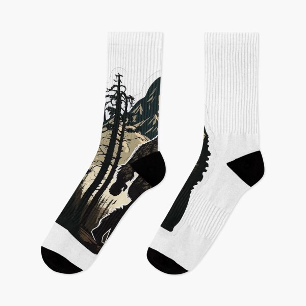 Item preview, Silhouette of Bigfoot walking in a mountain forest designed and sold by BrinaandPops.