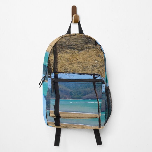 Item preview, White sand beach with pine tree trunks and mountain in backround designed and sold by kall3bu.