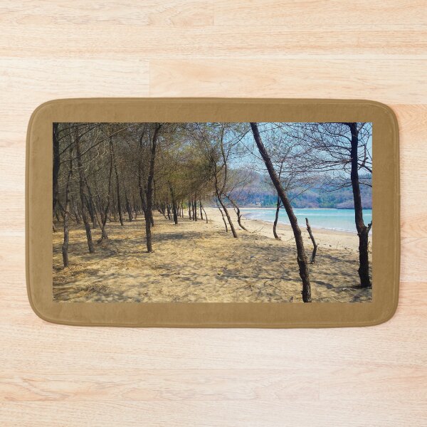 Item preview, Pine tree forest at Pacitan beach with mountain in backround designed and sold by kall3bu.