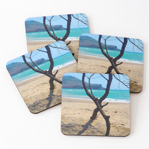 Item preview, Vertical view through two curved pine tree trunks to a sand beach designed and sold by kall3bu.
