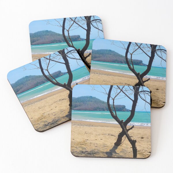 Item preview, View through two curved pine tree trunks to a sand beach designed and sold by kall3bu.