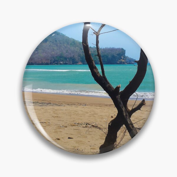 Item preview, View through two curved pine tree trunks to a sand beach designed and sold by kall3bu.