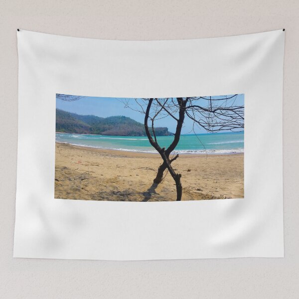 Item preview, View through two curved pine tree trunks to a sand beach designed and sold by kall3bu.